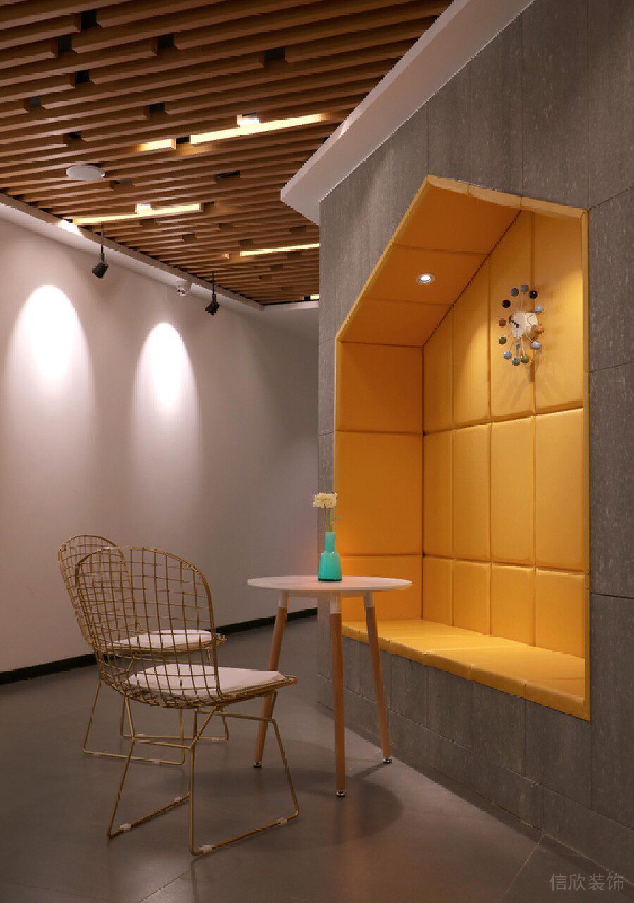 軟包橙色沙發(fā)墻體設(shè)計(jì)辦公室茶水間