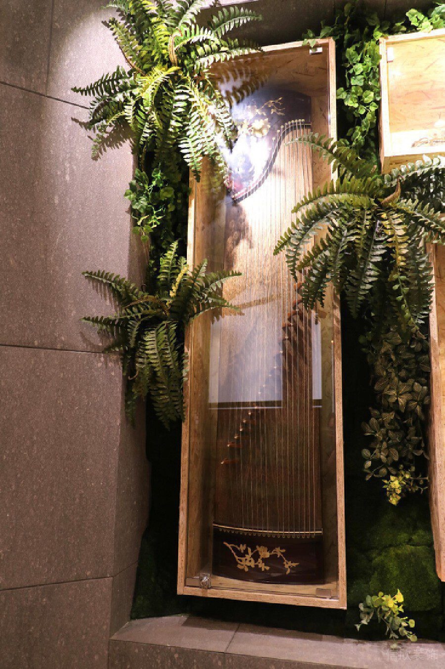 中國風(fēng)古琴產(chǎn)品展示區(qū)裝修設(shè)計培訓(xùn)機(jī)構(gòu)墻體裝修圖