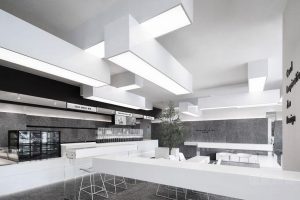 辦公室裝修設計咖啡廳休息區黑白色調現代簡約金屬座椅加厚簡約地毯裝修