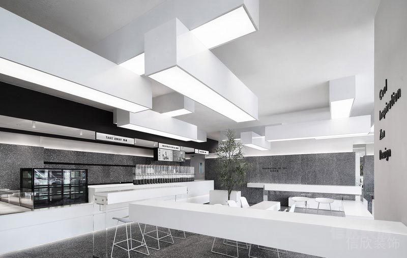 辦公室裝修設(shè)計(jì)咖啡廳休息區(qū)黑白色調(diào)現(xiàn)代簡(jiǎn)約金屬座椅加厚簡(jiǎn)約地毯裝修