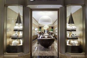 照明店鋪裝修櫥窗設(shè)計(jì)幾何線條大理石過(guò)道玻璃墻體隔斷效果圖