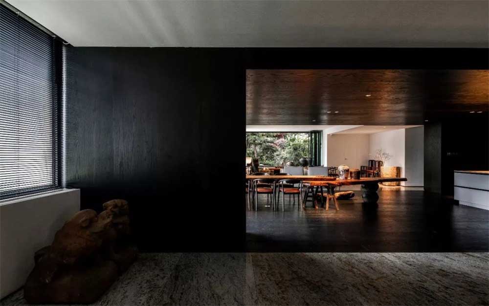 茶館裝修設計墻面深色木紋飾面效果圖