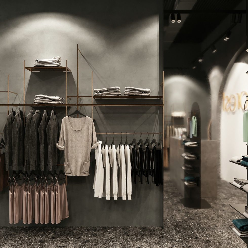 深圳市龍崗區平湖“森林” 名牌服裝店裝修設計墻面金色鋼管展架 深圳市龍崗區平湖“森林” 名牌服裝店裝修設計墻面金色鋼管展架