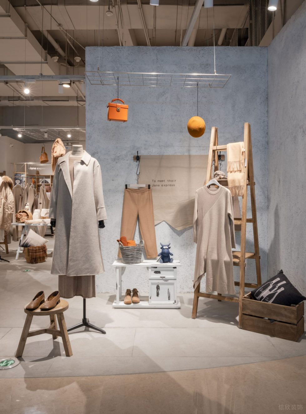 深圳市龍華區(qū)大浪現(xiàn)代風jane Express服裝店鋪裝修設(shè)計灰色水泥背景墻 深圳市龍華區(qū)大浪現(xiàn)代風jane Express服裝店鋪裝修設(shè)計灰色水泥背景墻