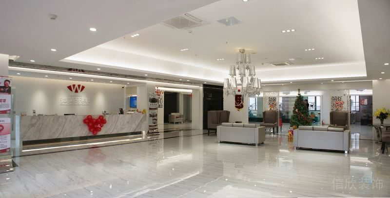 昆明薇思口腔牙科診所服務(wù)臺形象墻裝修設(shè)計