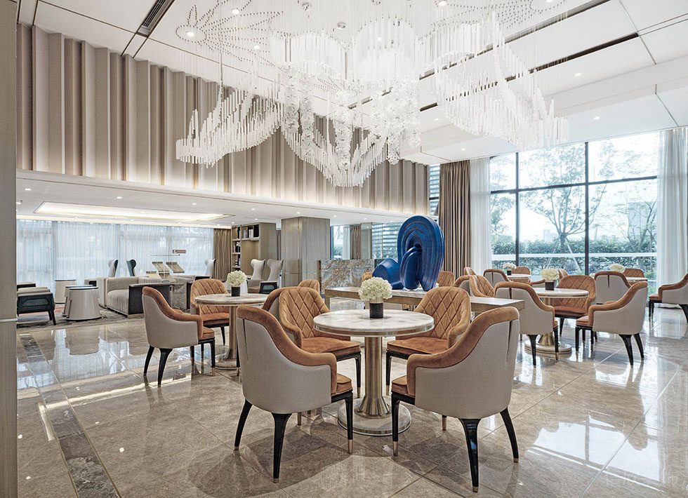 深圳福田區(qū)生命保險(xiǎn)大廈蓮花玫瑰金色調(diào)輕奢風(fēng)格辦公室裝修設(shè)計(jì)案例 接待洽談區(qū)