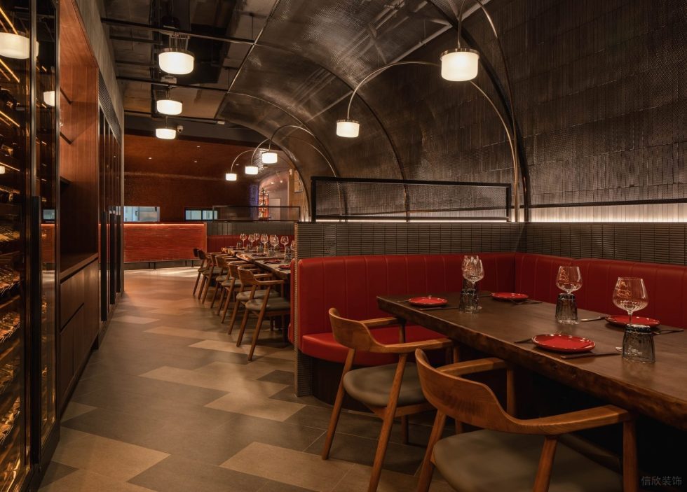 現(xiàn)代輕奢風(fēng)高級(jí)餐廳裝修設(shè)計(jì)紅色軟包搭深棕餐桌休閑卡座區(qū)效果圖