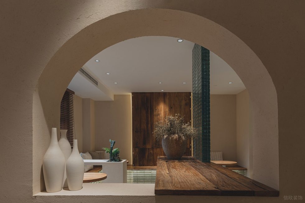 原木奶油風(fēng)咖啡廳弧形墻洞開口設(shè)計圖