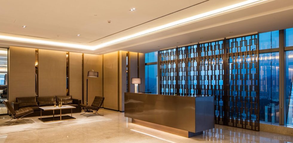 暖色調現代輕奢風辦公室裝修設計深色系接待處 暖色調現代輕奢風辦公室裝修設計深色系接待處