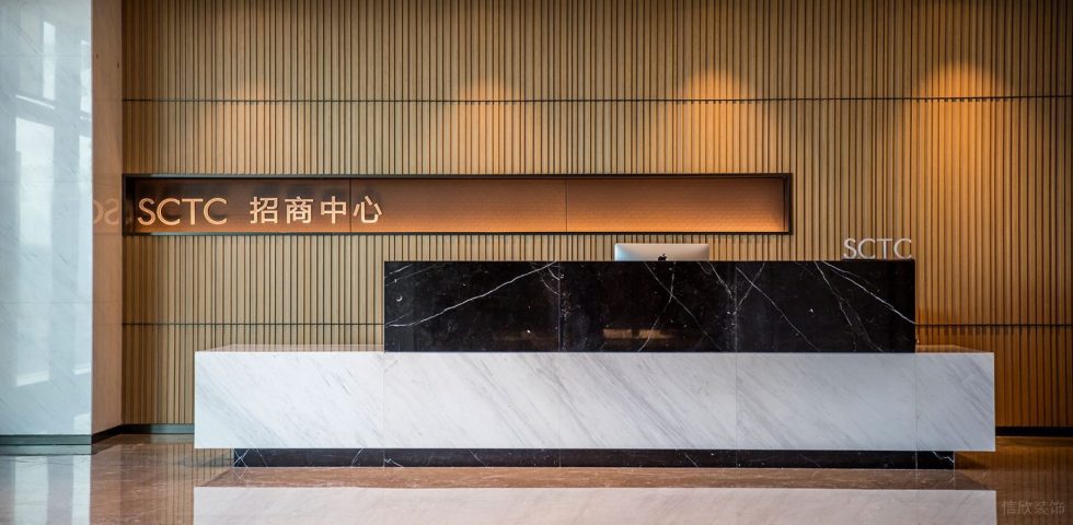 暖色調現代輕奢風辦公室裝修設計黑白色大理石前臺 暖色調現代輕奢風辦公室裝修設計黑白色大理石前臺